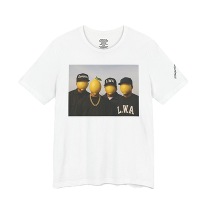 White t-shirt with graphic design of three people and a lemon on a white background